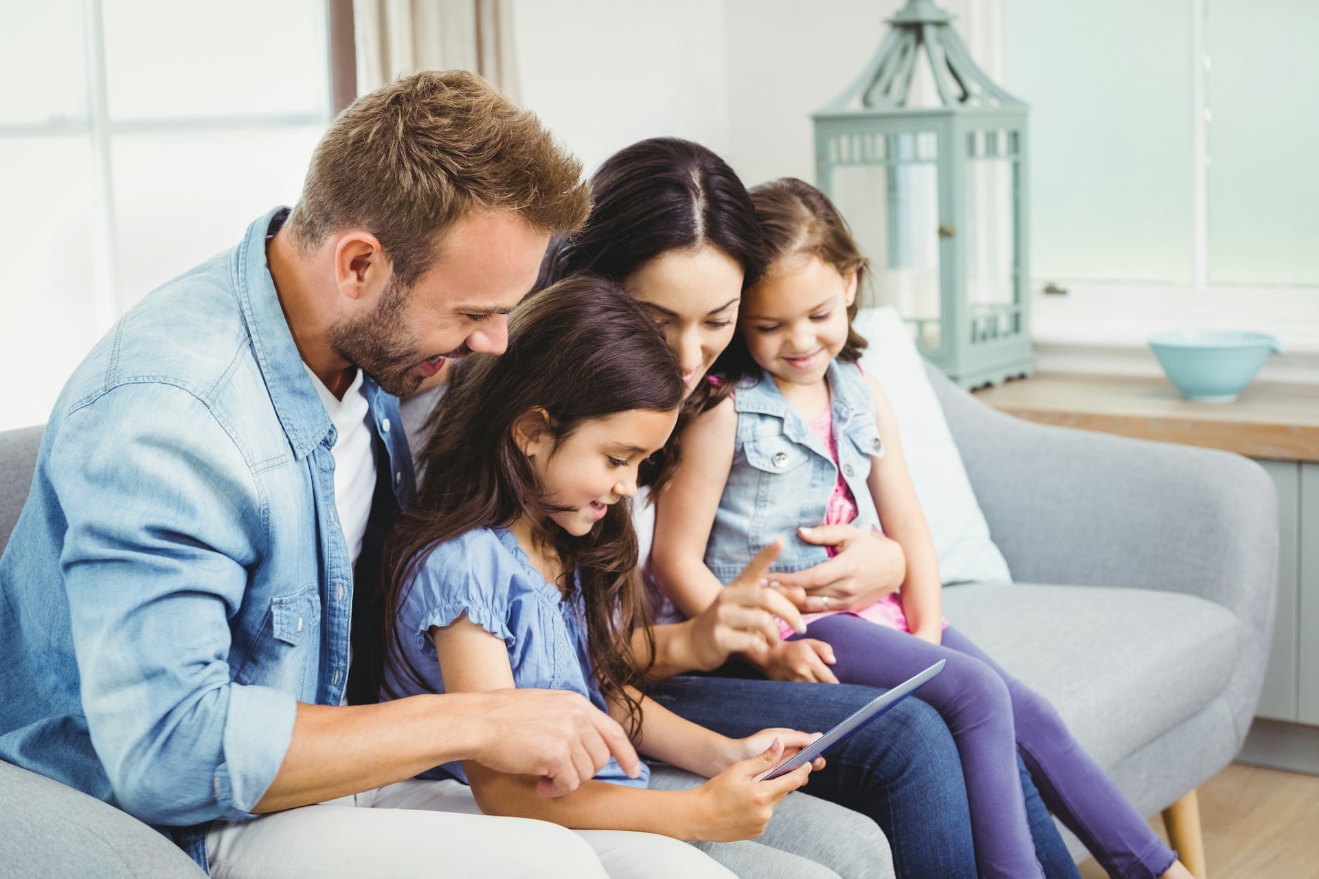 family looking at photos together